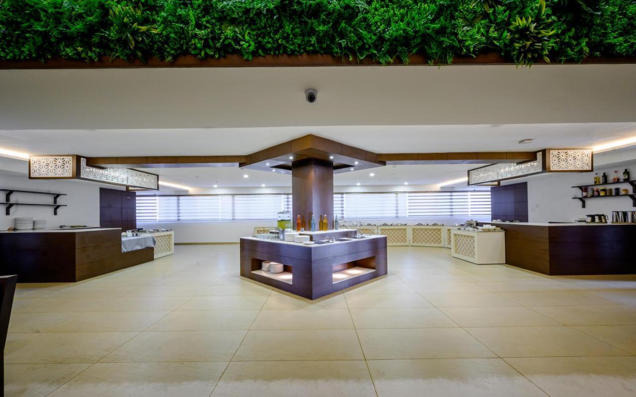 Essentia Manipal Inn Udupi Exteriör bild
